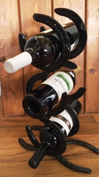 Horseshoe wine bottle and best sale glass holder